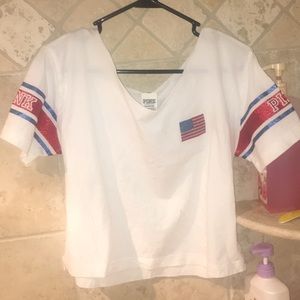 I’m selling a PINK red white and blue cropped tee